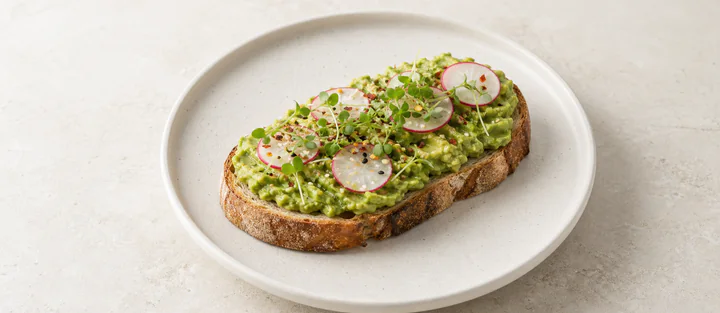 Avocado toast with radish and microgreens